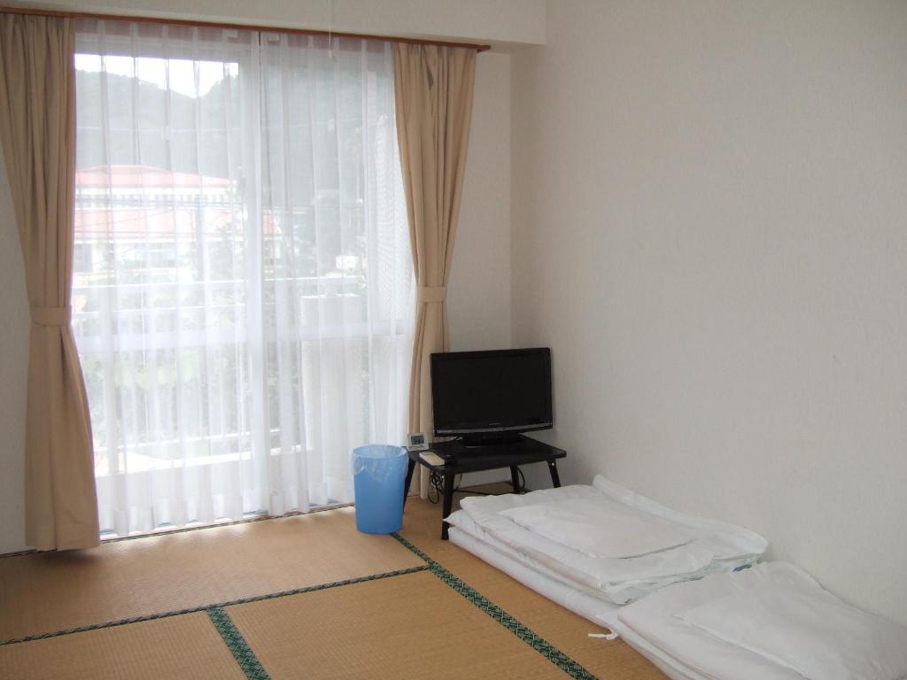 زمامي Pension Takatsuki الغرفة الصورة