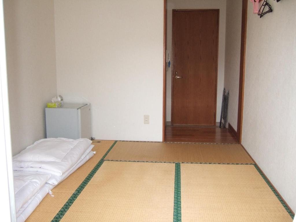 زمامي Pension Takatsuki الغرفة الصورة